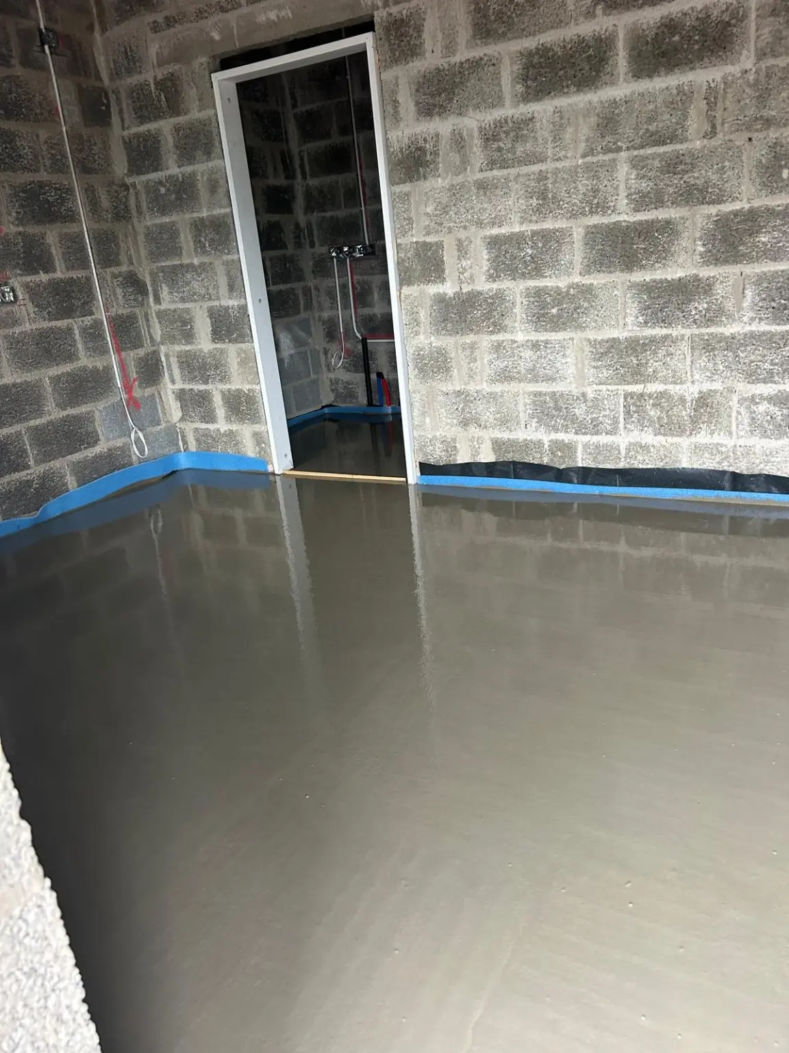 Detailed view of a newly laid smooth screed floor