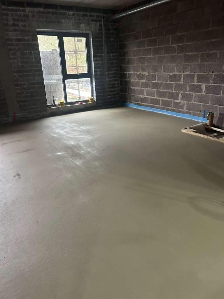 Liquid Screed floor in a block-built room with a window